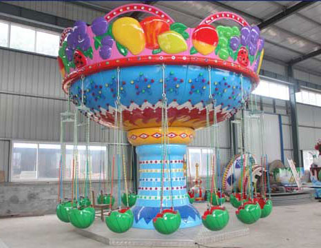 amusement swing carousel with watermelon